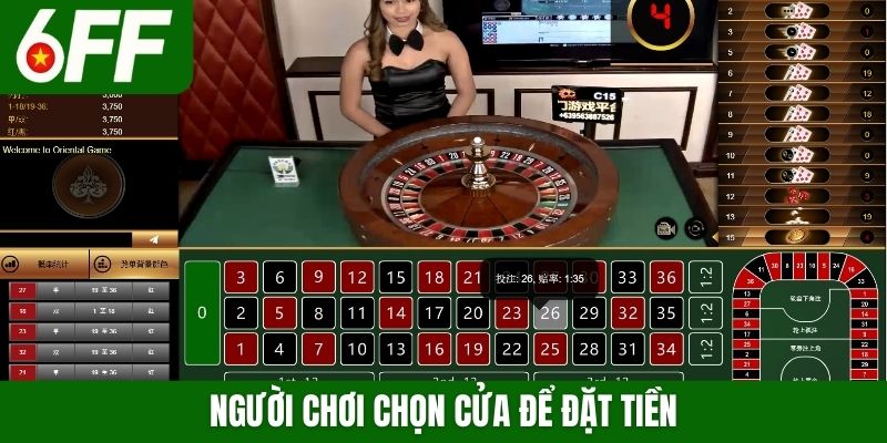 Người chơi chọn cửa để đặt tiền